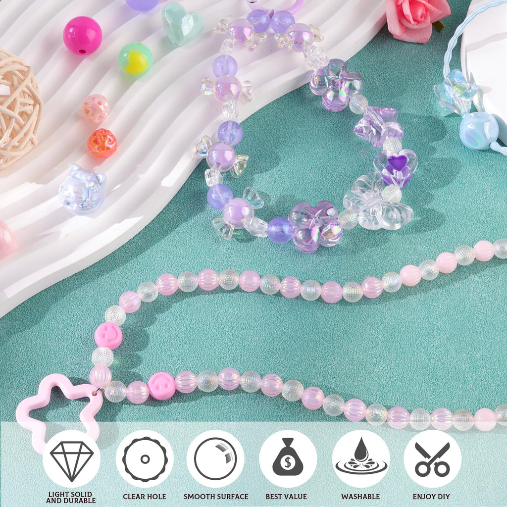 Assorted acrylic beads and charms for DIY jewelry making, including flower, heart, and candy shapes, displayed with finished bracelets.
