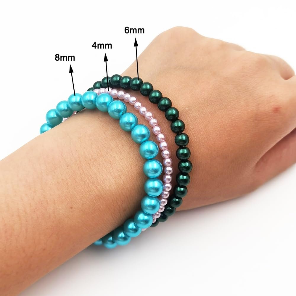 Three bracelets of different sized pearl beads on a wrist, labeled 8mm, 4mm, and 6mm.