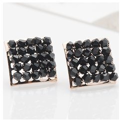 Pair of square black crystal faceted bead earrings on a white background