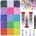 Assorted colorful rhinestones in a divided organizer tray with three tubes of B-7000 adhesive glue, tweezers, and a pickup pen.