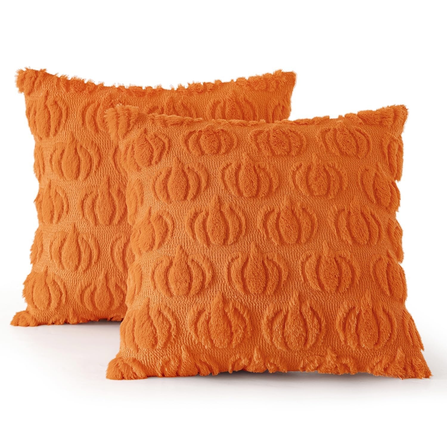 Two orange faux fur pumpkin-patterned throw pillow covers on a white background.
