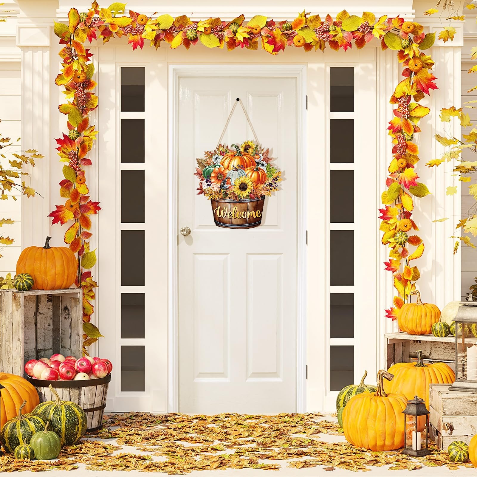 Front door decorated for autumn with a hanging welcome sign, pumpkins, and fall foliage garland.