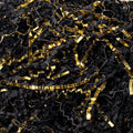 Pile of black and gold crinkle cut paper shred filler for gift boxes and baskets
