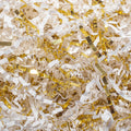 Close-up of white and gold crinkle cut paper shred filler for gift boxes and baskets.