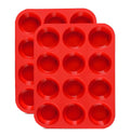 Two red silicone 12-cup muffin pans shown from a top-down angle against a white background.