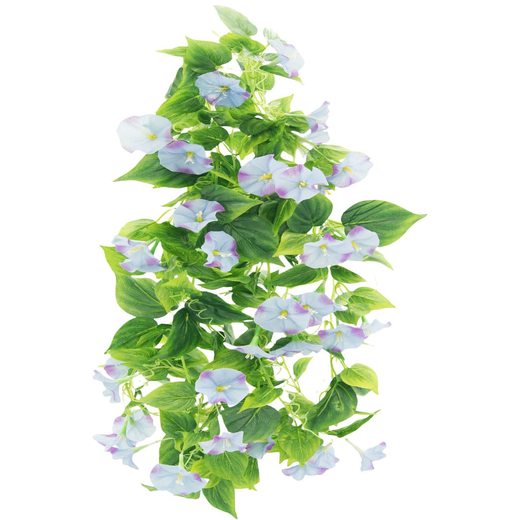 Artificial morning glory vine garland with light blue and purple flowers and green leaves, isolated on white.