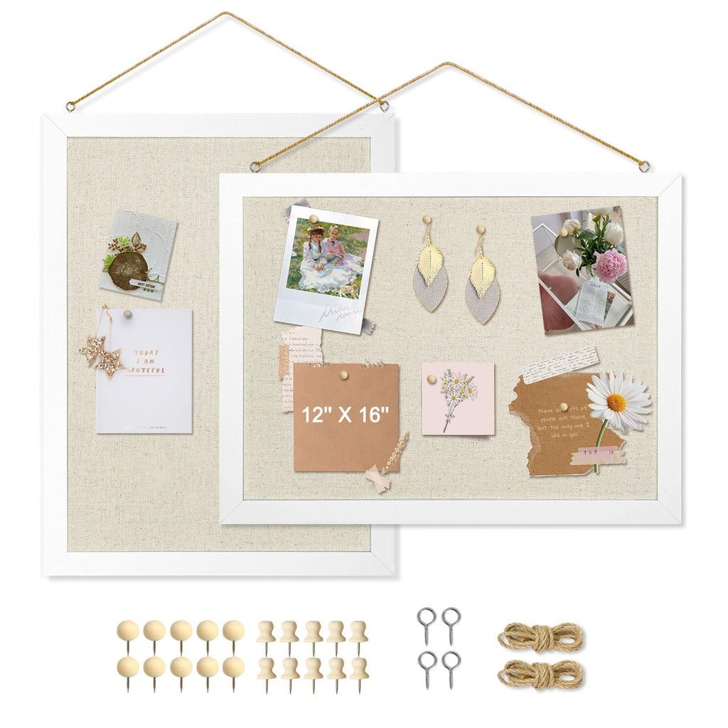 Two linen cork boards with white wood frames, one displaying a photo, earrings, and cards, the other displaying a photo, flowers, and text. Includes pushpins, hanging hardware, and twine.