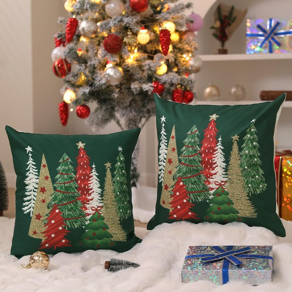 Two green Christmas pillow covers with festive tree designs, displayed in a cozy holiday setting with a decorated tree and gifts.