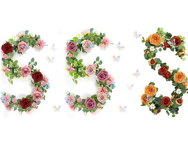 Three artificial eucalyptus garlands with navy blue flowers and silver butterflies arranged in a decorative pattern on a white background.