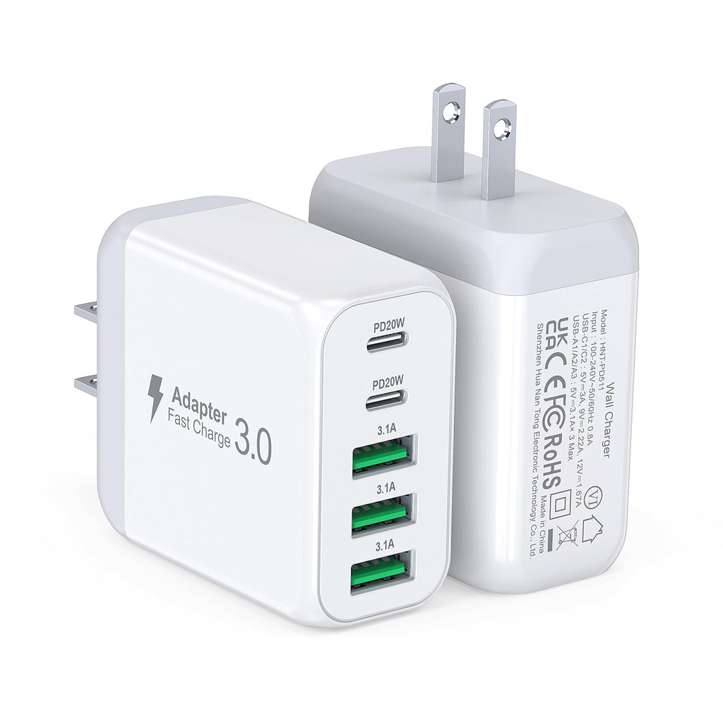 Two white USB-C wall chargers with multiple ports, one angled to show 'Adapter Fast Charge 3.0' and the other showing technical specifications.