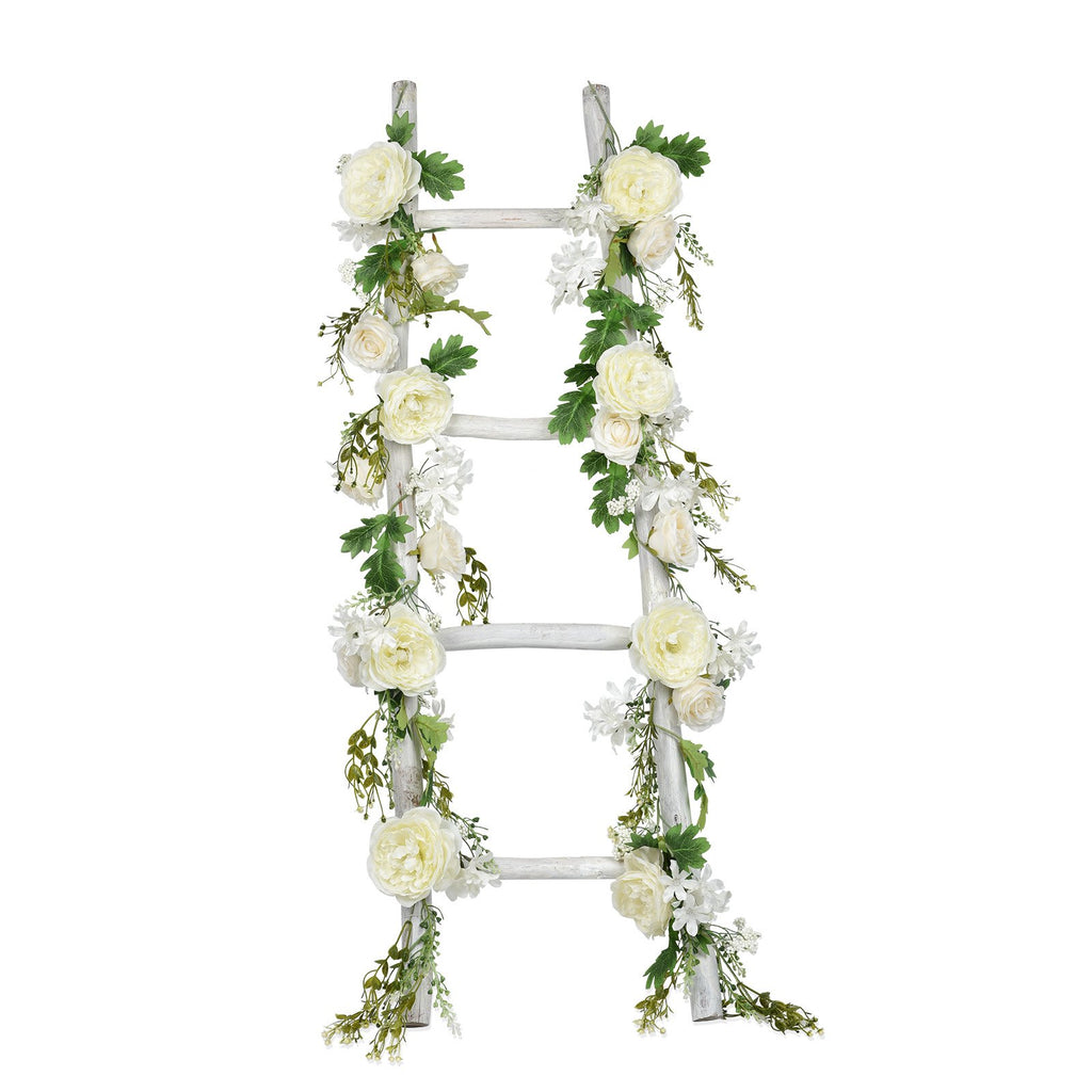 White wooden ladder decorated with artificial white peony flower garlands and greenery, isolated on white background.