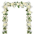 White artificial peony flower garland archway with green leaves on a white background