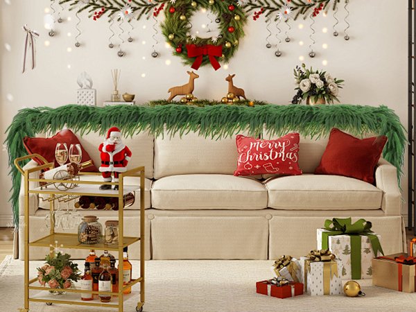 Christmas garland draped over a sofa with festive decor, including a wreath, lights, and gifts.