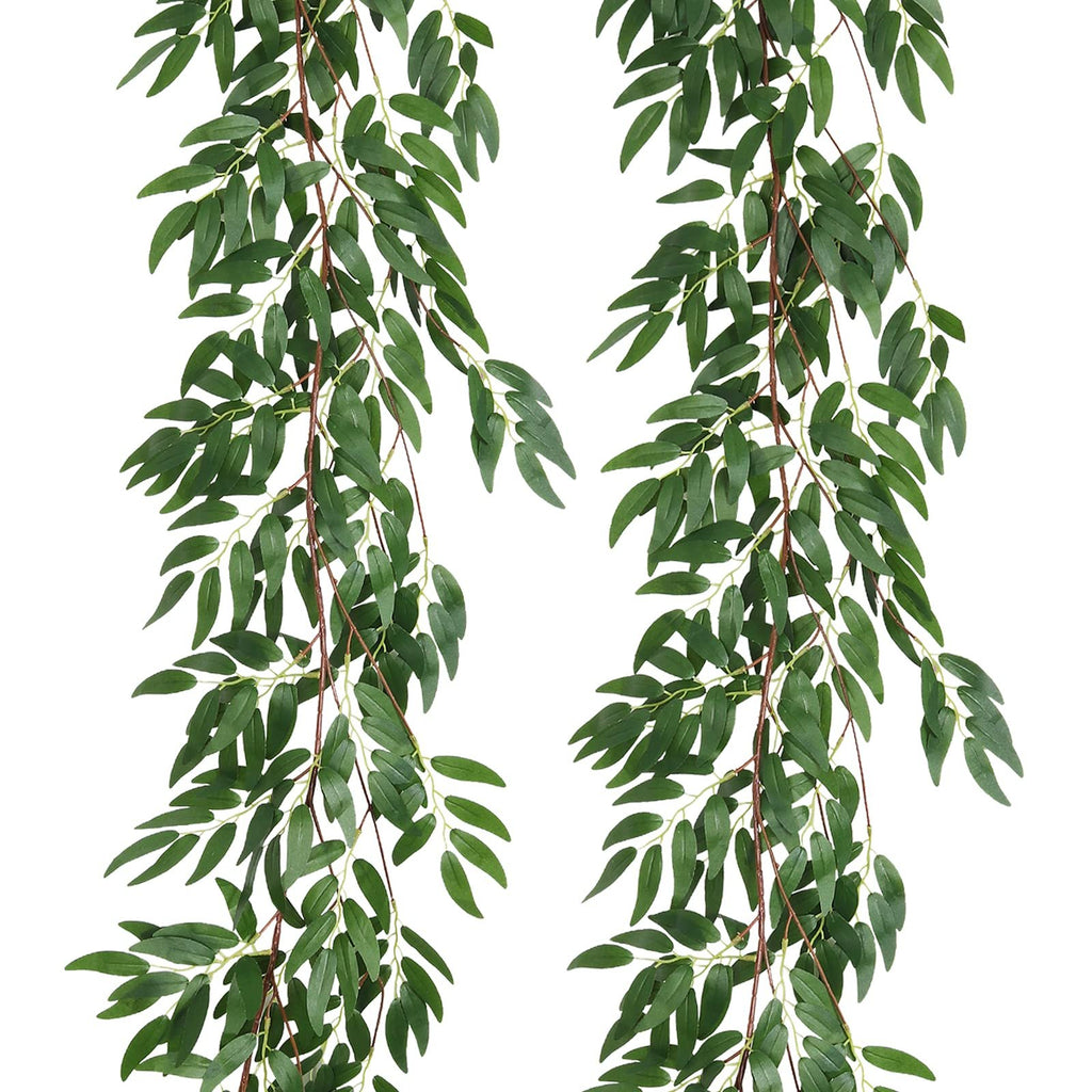 Two artificial willow vine garlands with green silk leaves and brown plastic stems against a white background.