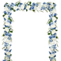 Artificial blue and white peony garland arranged in an arch shape on a white background