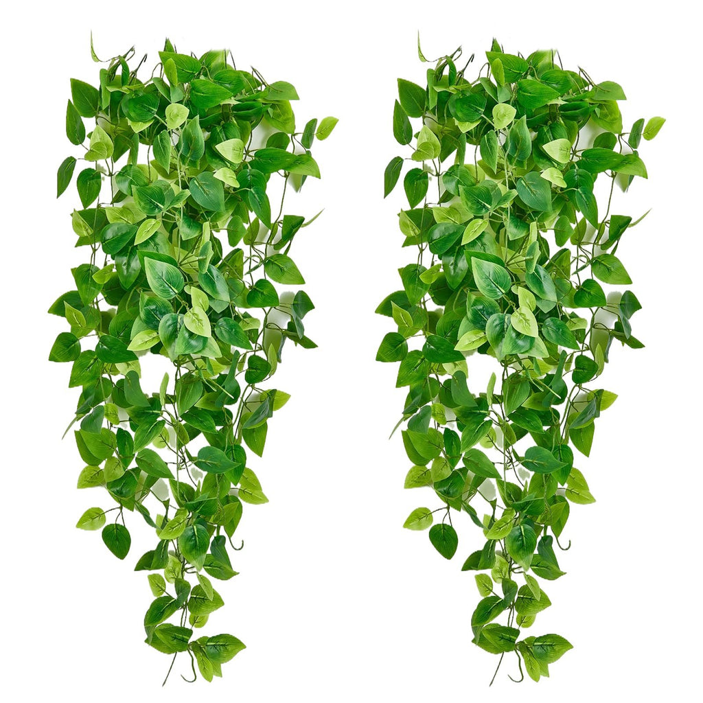 Two artificial ivy hanging vines with green leaves against a white background