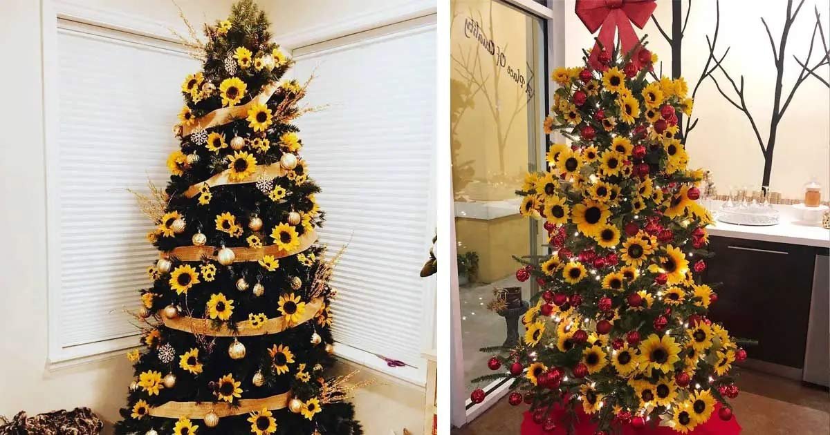 Two Christmas trees decorated with artificial sunflowers, gold ribbon, and ornaments.