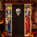 Dia de los Muertos porch banners with skeleton couple, one playing guitar, the other holding a fan, illuminated by string lights.