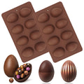 Two brown silicone Easter egg molds with chocolate eggs and candies on a white background