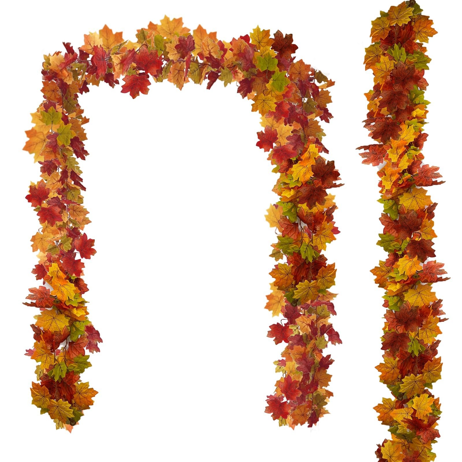 Two artificial maple leaf garlands in autumn colors arranged in an arch and a vertical line against a white background.