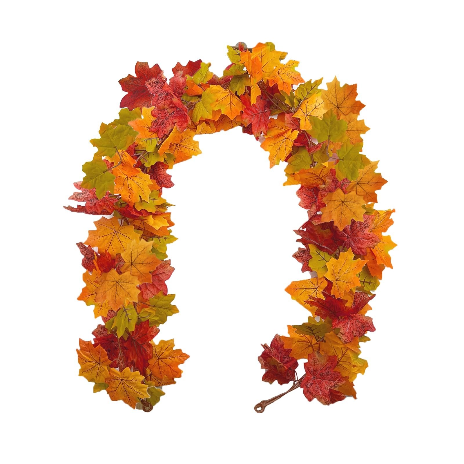 Artificial maple leaf garland in fall colors arranged in a U-shape on a white background.