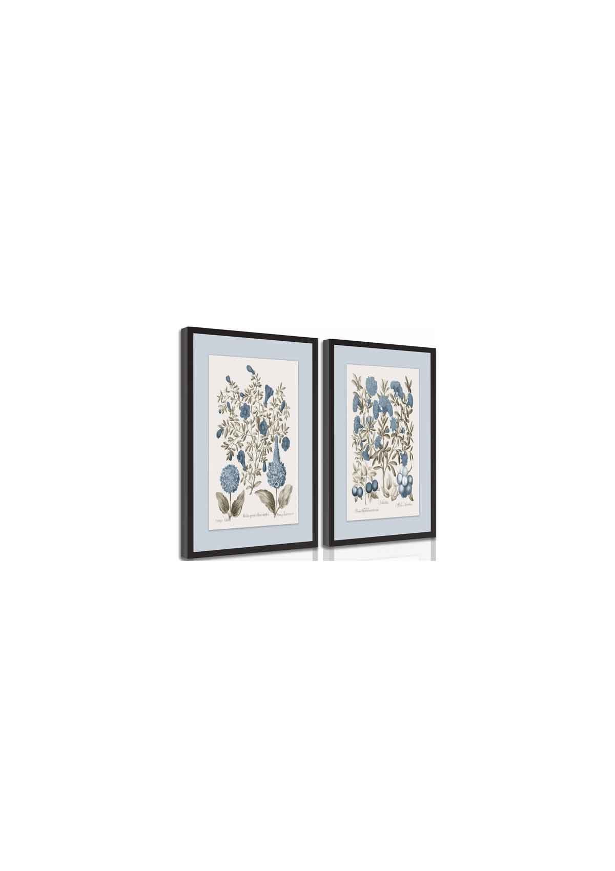Two framed botanical prints of blue hydrangeas and berries on a light blue mat, displayed at an angle.