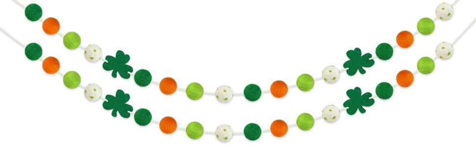 Two St. Patrick's Day felt ball garlands with shamrock shapes, featuring green, orange, and white pom poms on white strings.