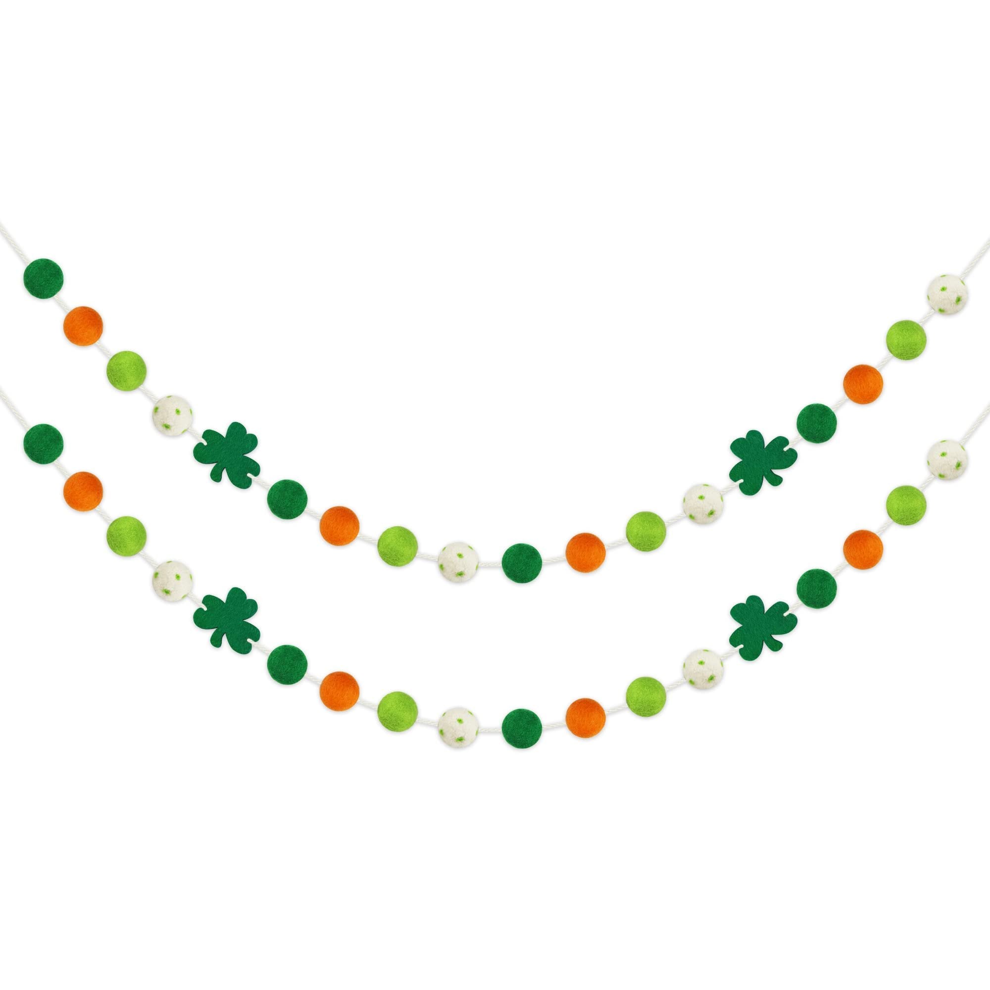 Two St. Patrick's Day felt ball garlands with shamrocks and pom poms in green, orange, and white.