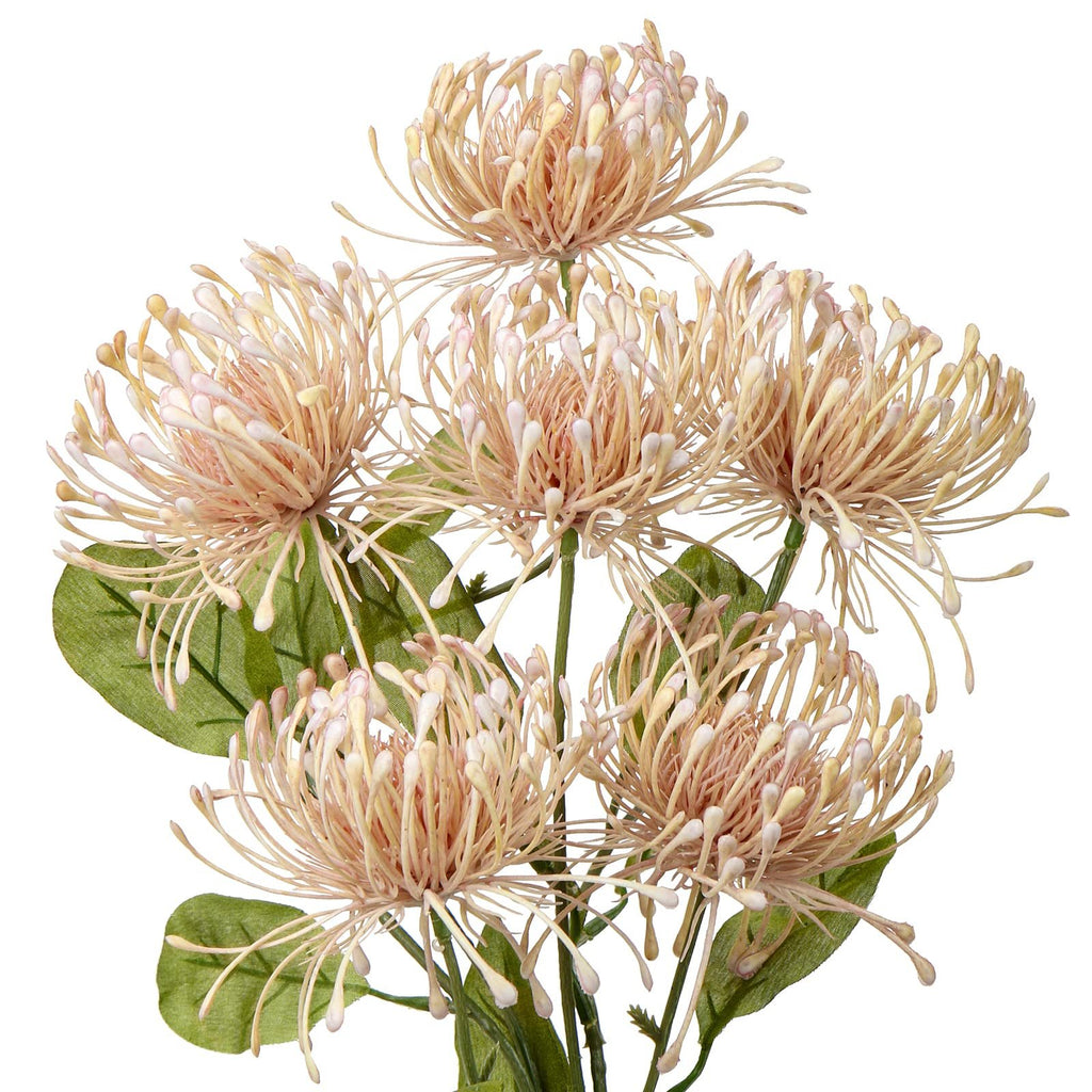 Bouquet of six artificial pink chrysanthemum flowers with green leaves on a white background