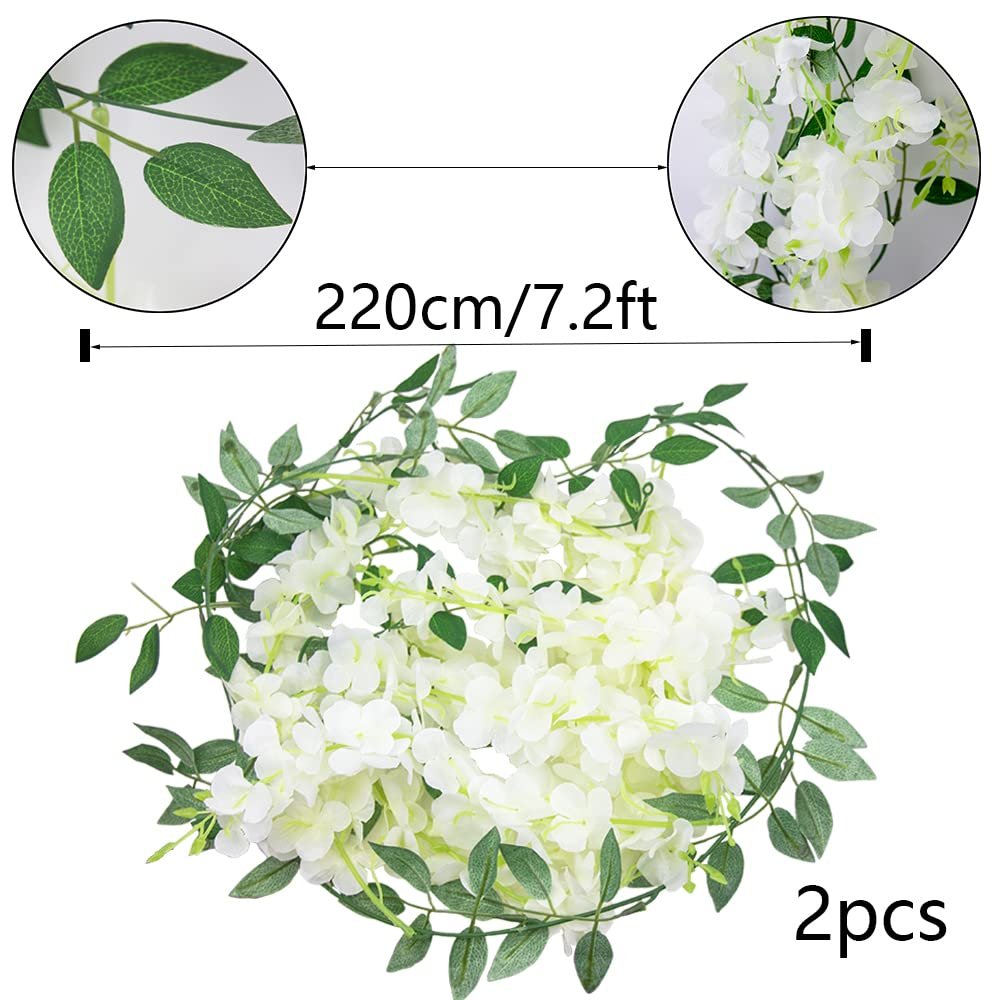 Two white artificial wisteria hanging flower vines with green leaves, showing a close-up of leaves and flowers, and indicating 220cm/7.2ft length and 2 pieces.