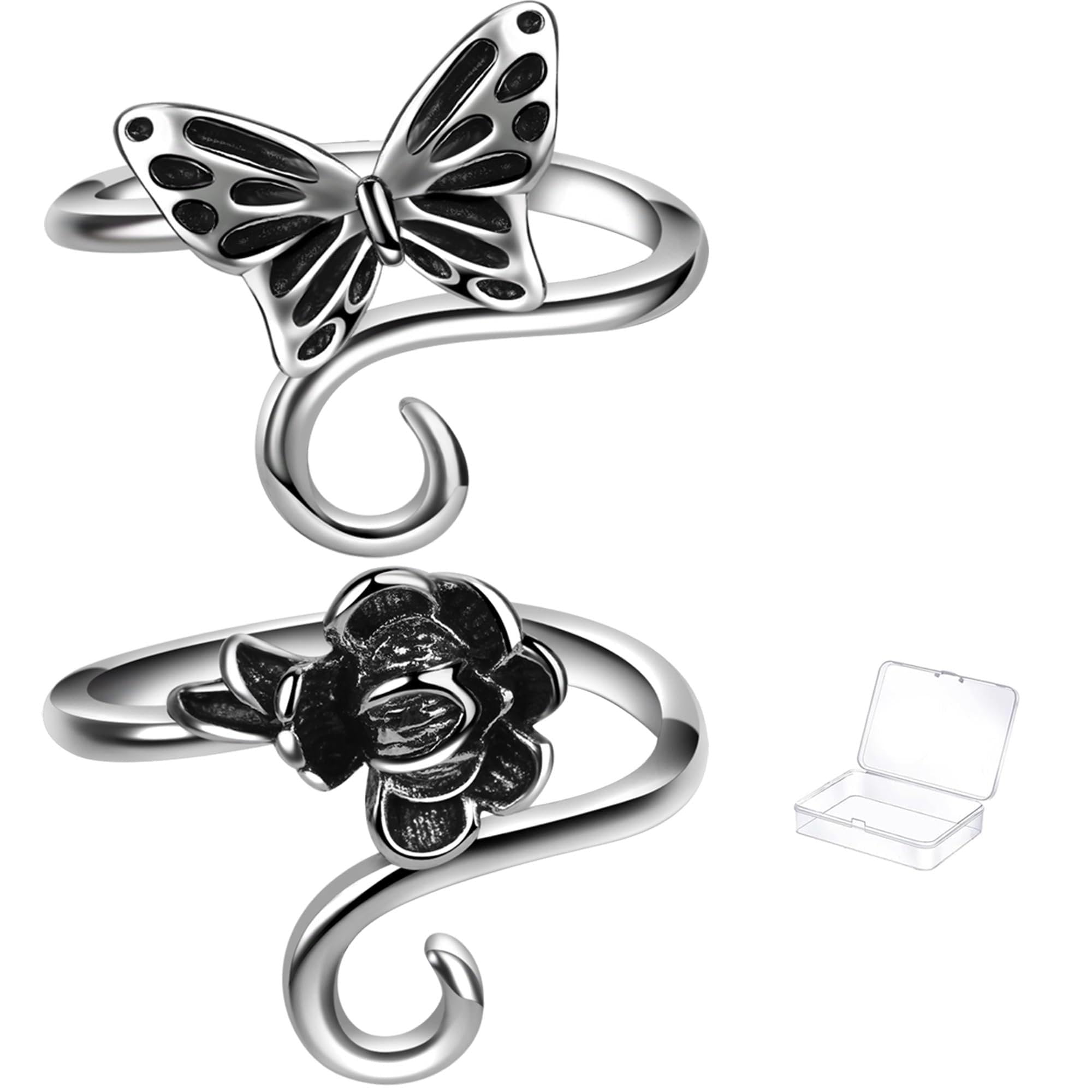 Two adjustable metal yarn tension rings, one with a butterfly motif and the other with a rose motif, shown with a small clear storage box.
