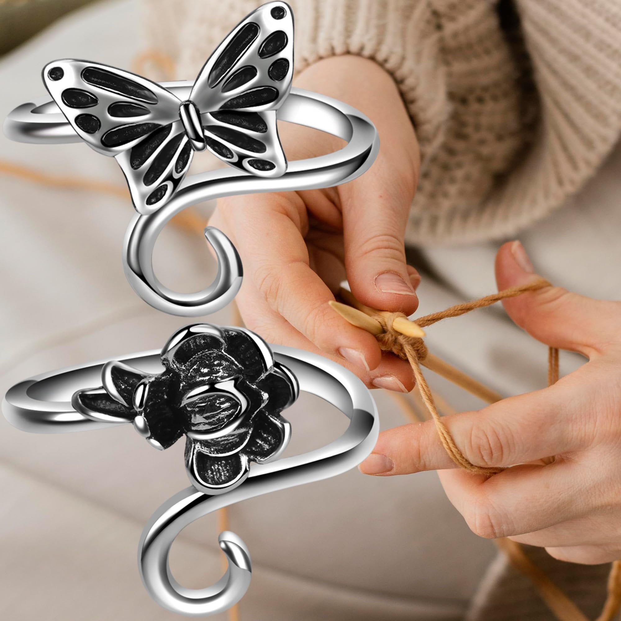 Two adjustable metal yarn rings, one with a butterfly motif and one with a rose motif, shown with hands knitting.