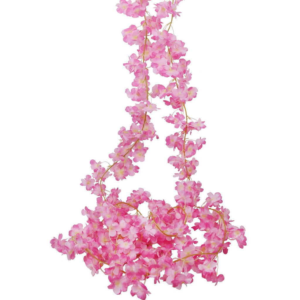 Two strands of artificial pink cherry blossom garland hanging against a white background.