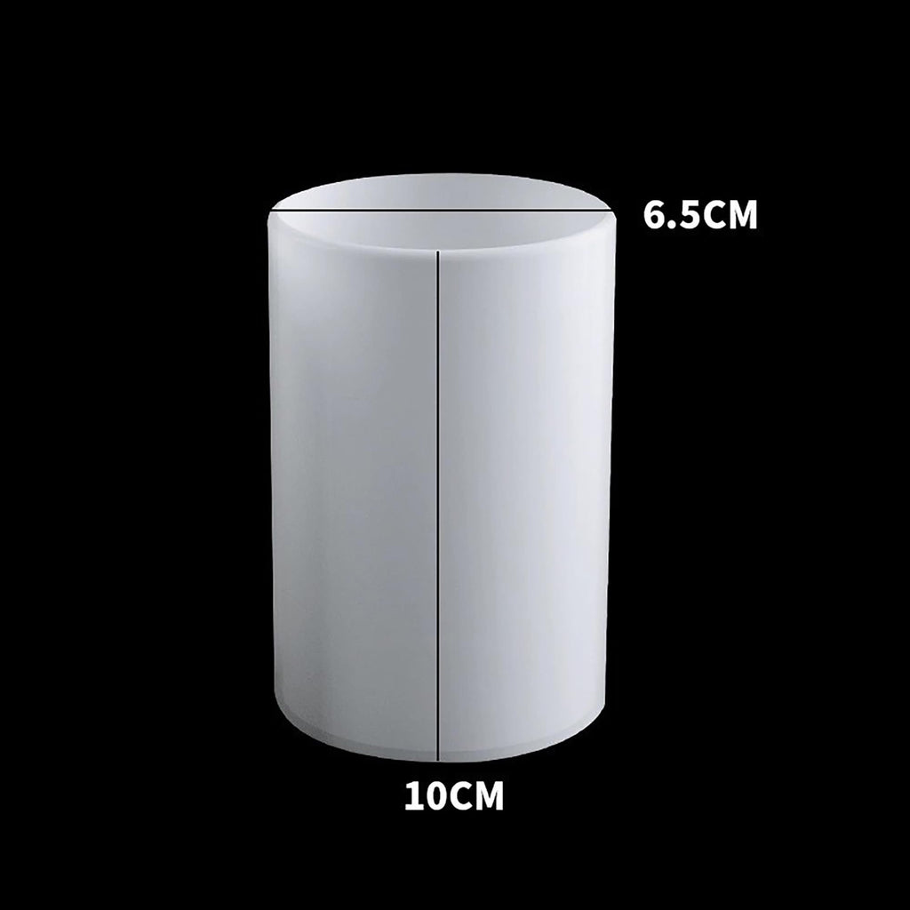 White 3D cylinder silicone mold with dimensions 6.5cm and 10cm marked, on a black background.