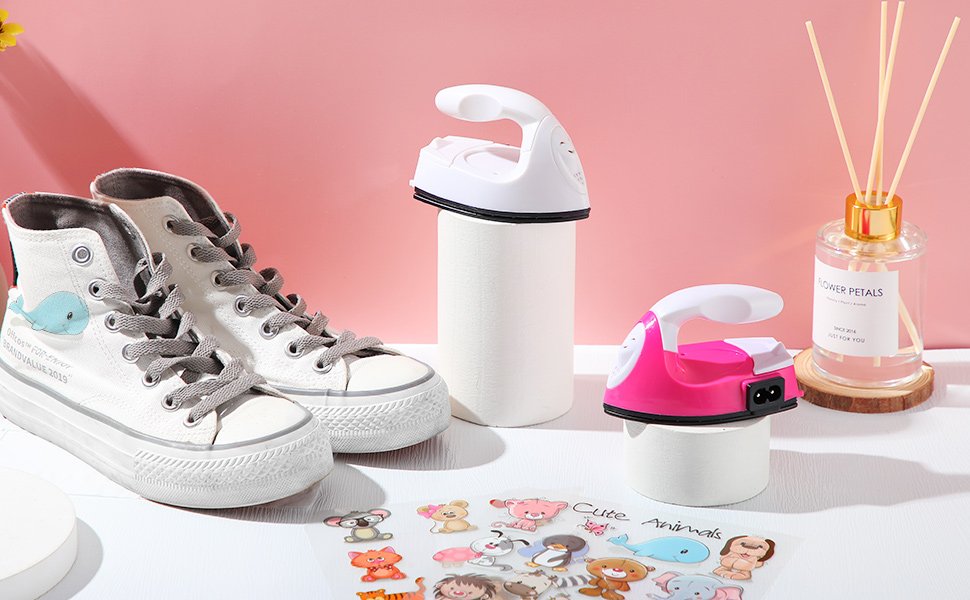 Two mini craft irons, one white and one pink, displayed with white high-top sneakers and a sheet of cute animal stickers.