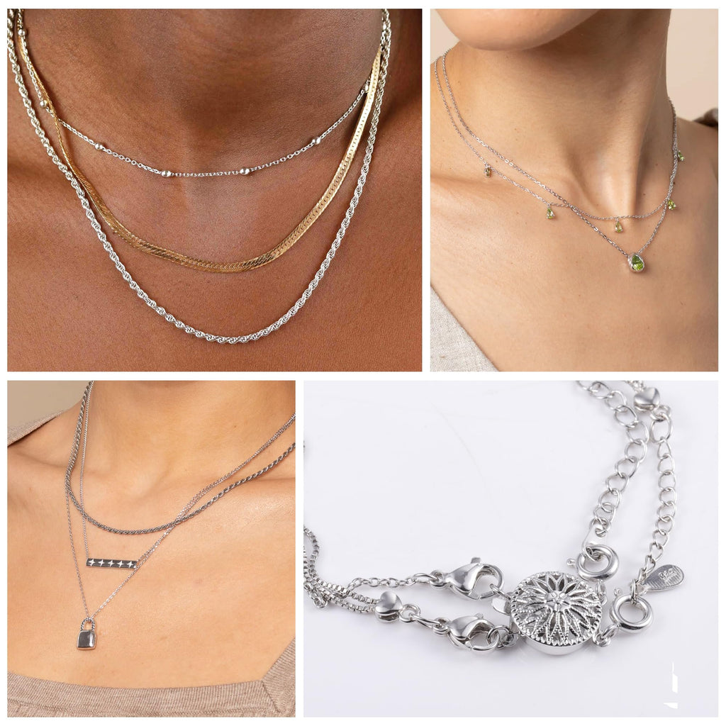 Layered necklaces with different chain styles and pendants, including a lock and a bar with stars.