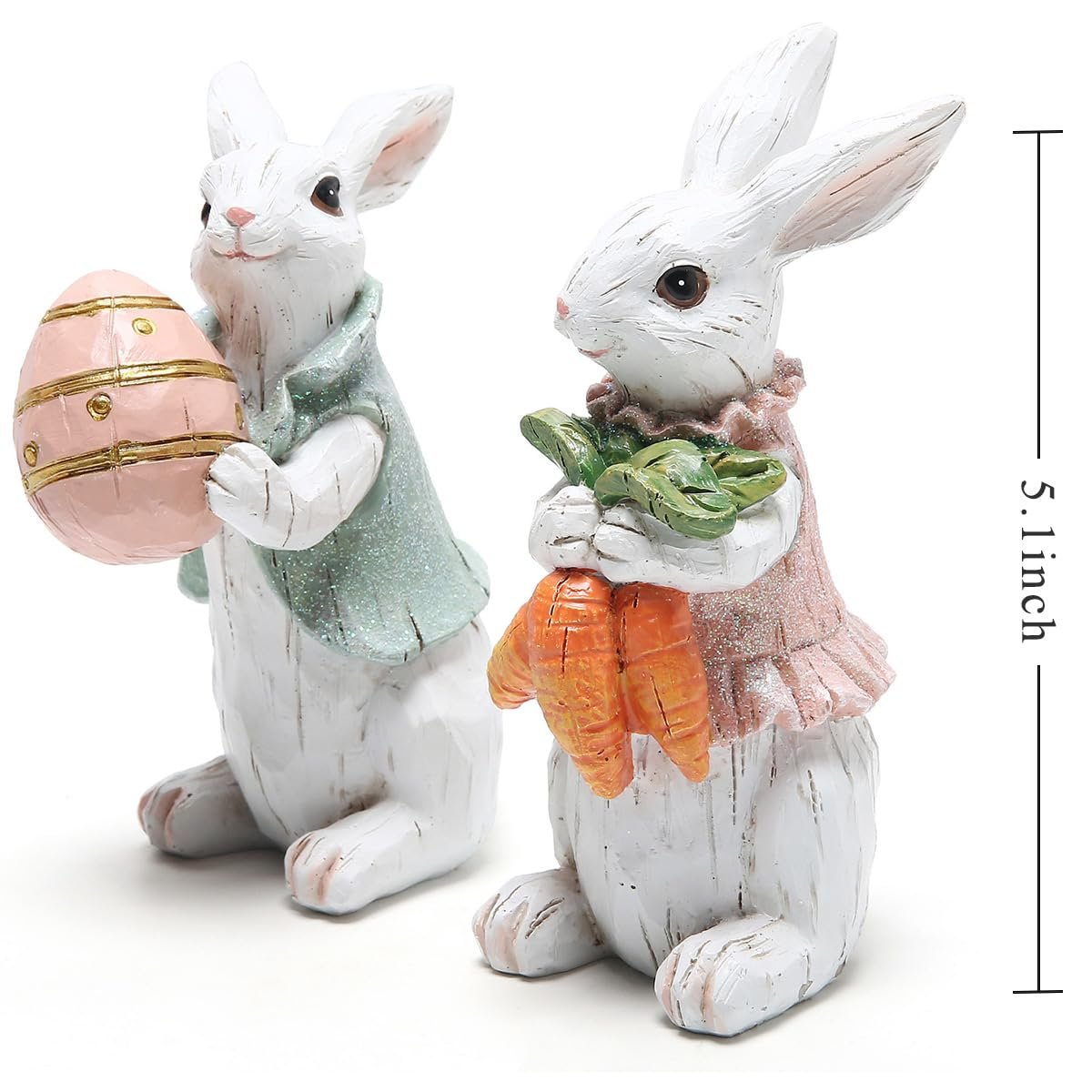 Two hand-painted resin Easter bunny figurines, one holding a pink egg, the other holding carrots.