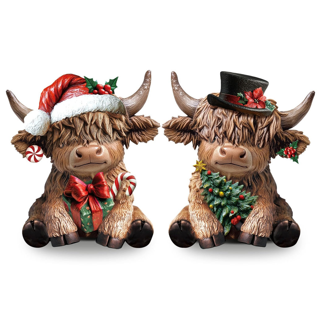 Two resin highland cow figurines dressed for Christmas, one with a Santa hat and gift, the other with a top hat and Christmas tree.