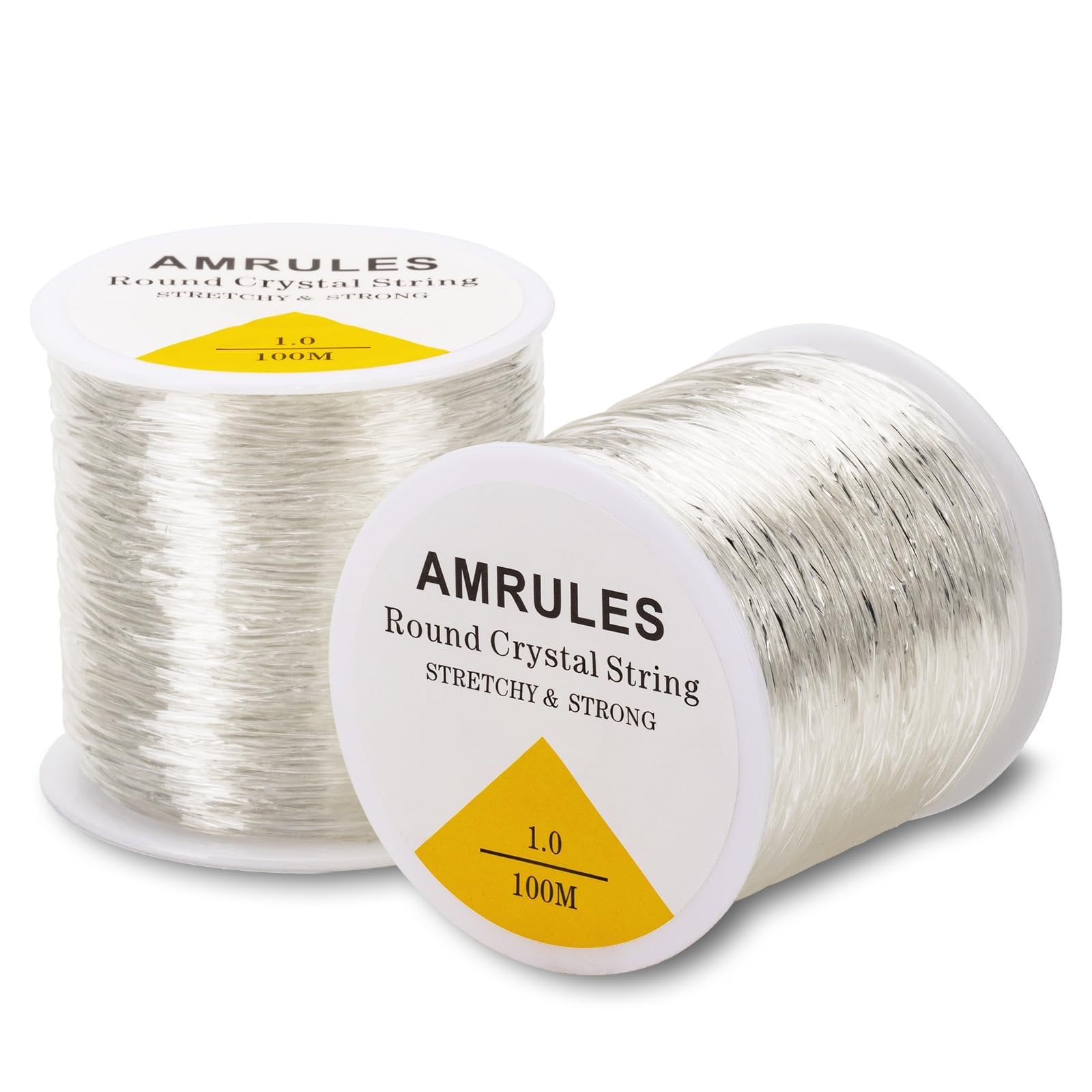Two spools of clear elastic string for jewelry making, labeled with brand and specifications.