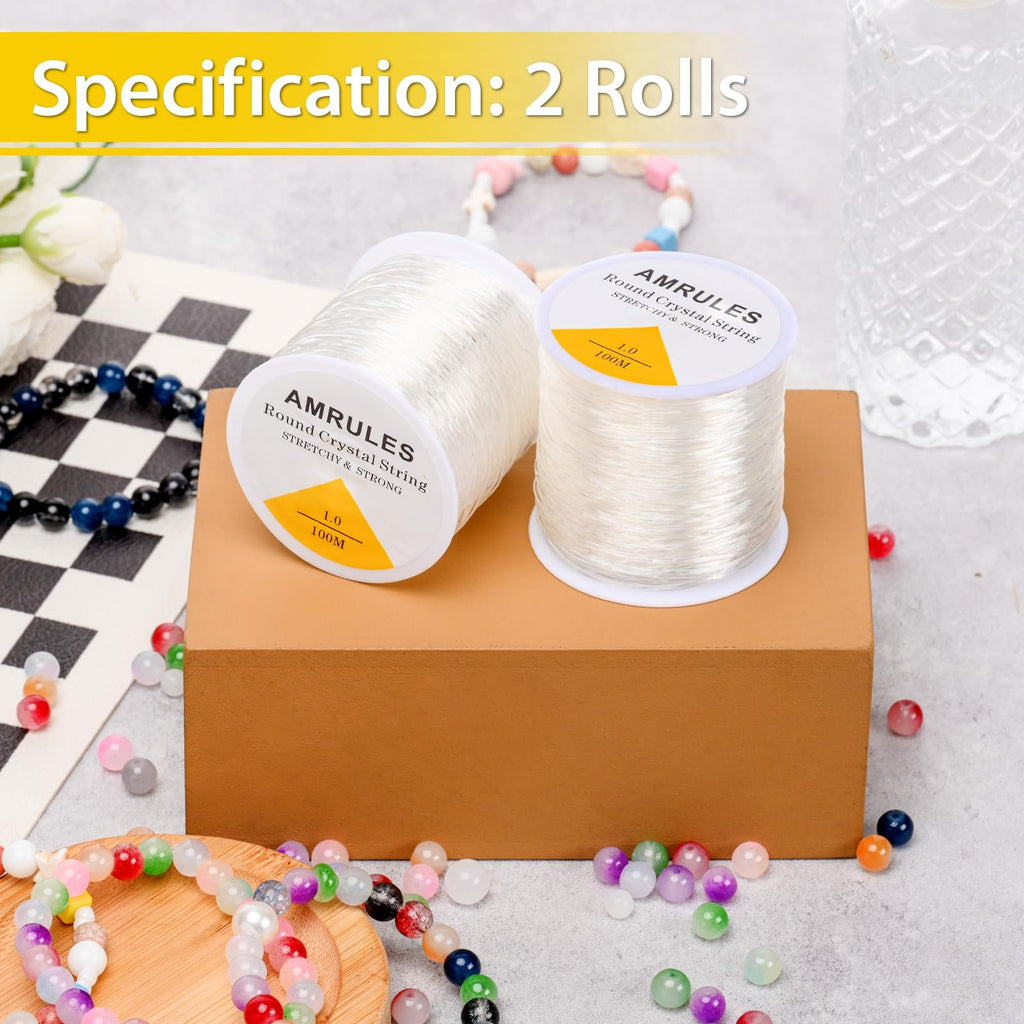 Two spools of clear elastic string for jewelry making, surrounded by colorful beads and finished bracelets.