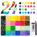 Flat lay of a 24-color rhinestone kit with a divided storage case, B-7000 glue, tweezers, and wax pencil.