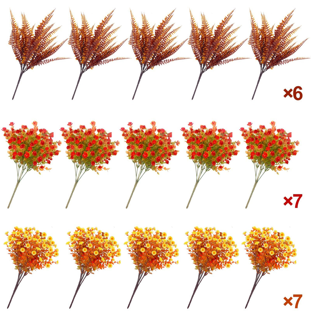 Assortment of artificial fall flowers and foliage stems in brown, red, and yellow hues, arranged in rows on a white background.