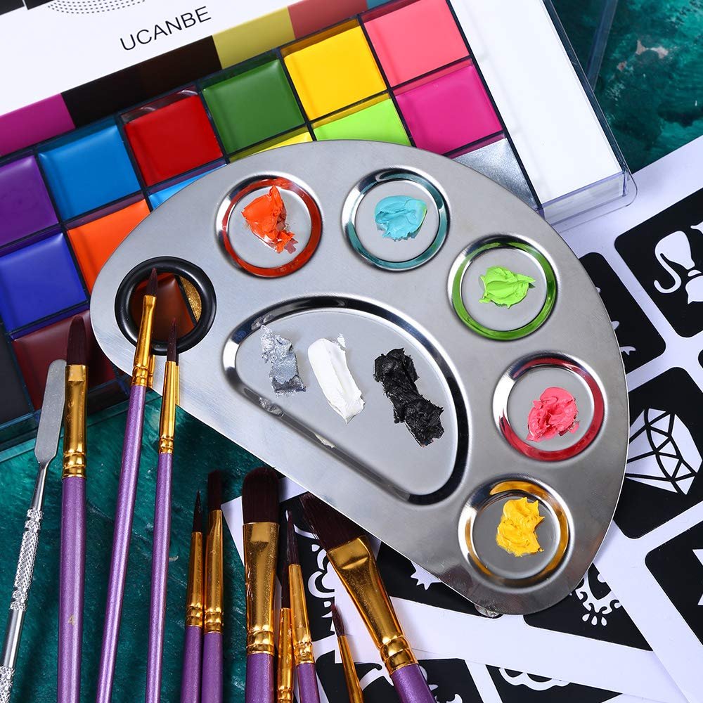 Face and body paint kit with 20 colors, stainless steel palette, spatulas, brushes, and stencils.