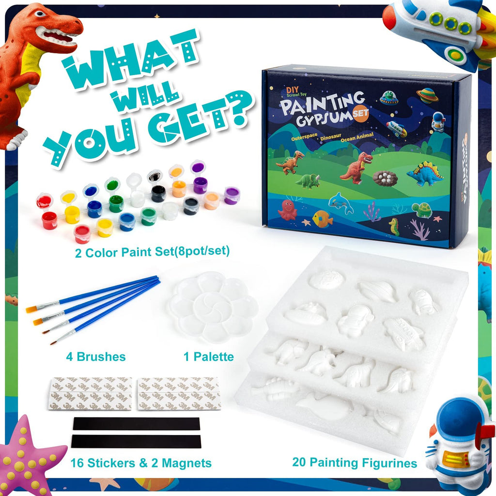 Plaster painting kit contents including paint pots, brushes, palette, stickers, magnets, and plaster figurines.