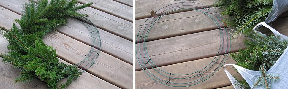 Two green wire wreath frames on a wooden deck, one partially decorated with evergreen branches.