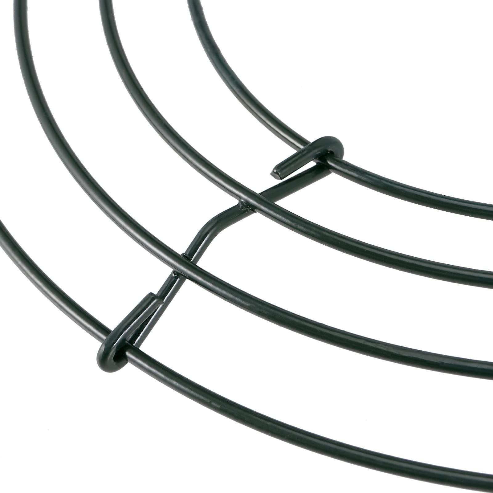 Close-up of green wire wreath frames showing construction details on a white background.