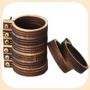 Miniature wooden embroidery hoops with brass screws, one assembled and two disassembled, on a white background.