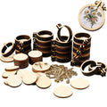 Mini wooden embroidery hoops and round wooden discs scattered on a white background, with one hoop showing a floral embroidery.