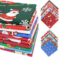 Stack of Christmas-themed cotton fabric squares with Santa and snowflakes, and a fanned-out display of more squares.