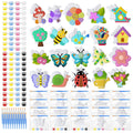 Spring DIY ceramic painting kit with plaster figurines, acrylic paints, and brushes.